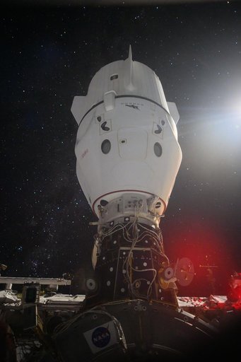 A SpaceX Dragon Spacecraft is Pictured Docked to the International Space Station