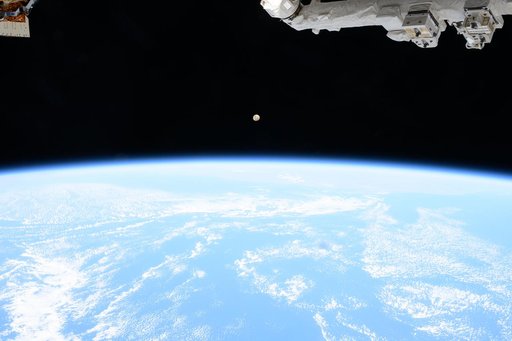 A Waxing Gibbous Moon Rises Over the Indian Ocean