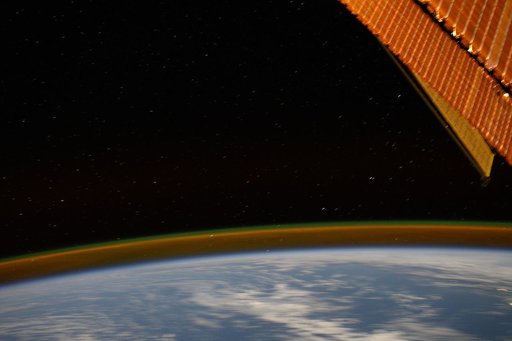 A Golden Atmospheric Glow Crowns Earth's Horizon