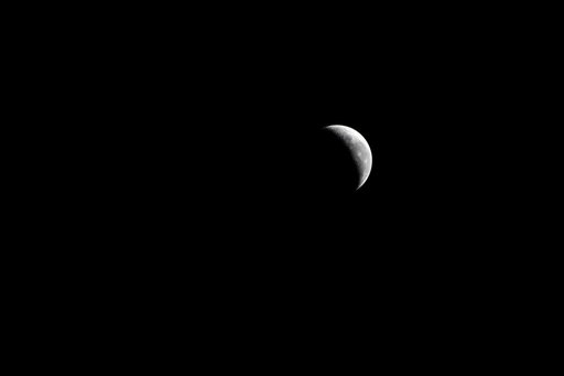 A Waning Crescent Moon Above Italy