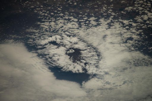 Mount Kilimanjaro surrounded by clouds and the highest mountian in Africa