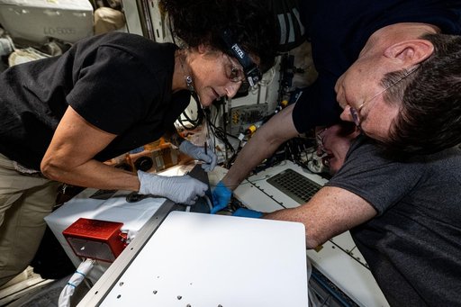 NASA astronauts Suni Williams, Mike Barratt, and Butch Wilmore