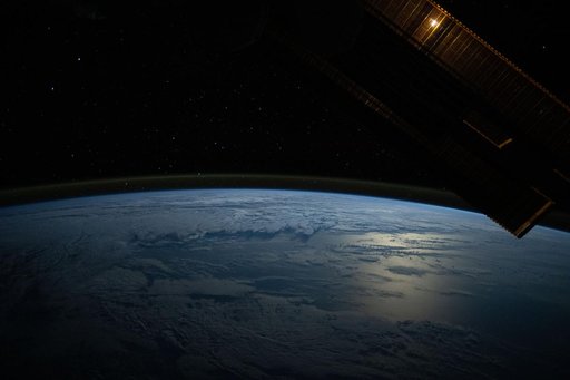 The Moon's glint beams off the Pacific Ocean