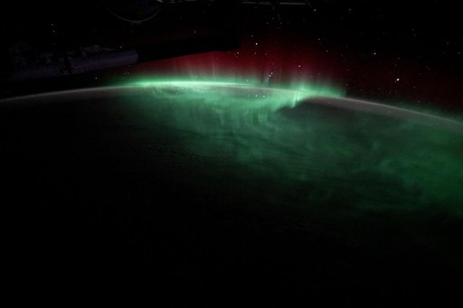Green aurora dance above the Indian Ocean