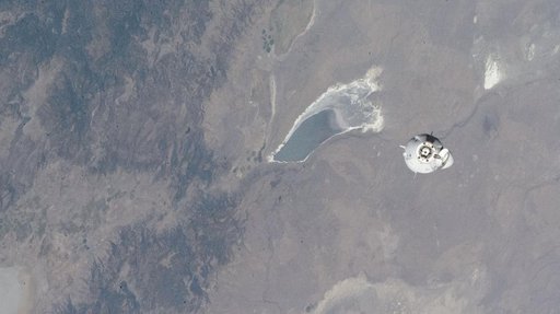 The SpaceX Dragon Freedom approaches the station above Lake Abert in Oregon