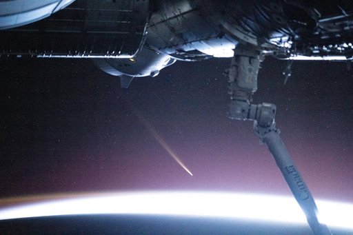 Comet C/2024 G3 (ATLAS) is pictured seemingly above Earth's atmosphere