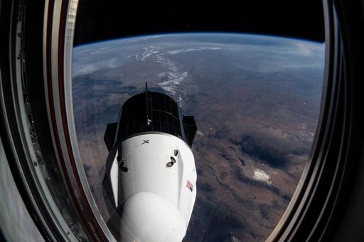 The SpaceX Dragon Freedom spacecraft is pictured docked to the forward-facing port of the Harmony module
