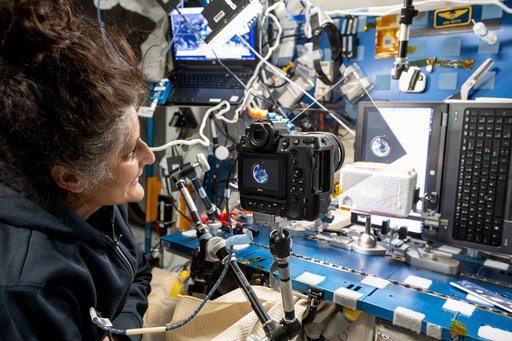 Astronaut photographs ice crystals forming inside a sheet of water