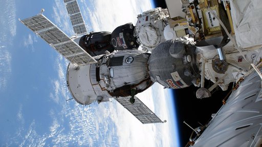 Two Soyuz crew ships are pictured docked to the International Space Station