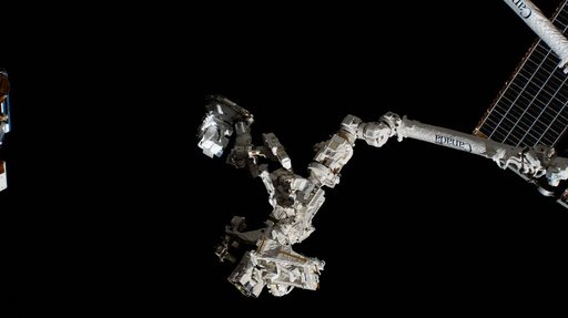 The fine-tuned robotic hand, better known as Dextre, carries the CODEX experiment