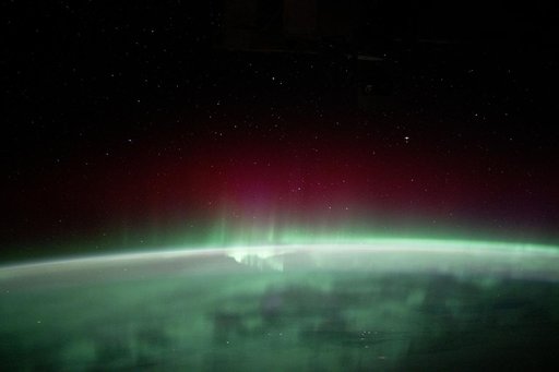 The aurora borealis blankets the Earth