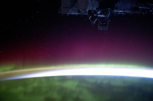 The aurora borealis blankets the Earth