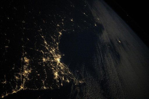 The city lights along the New England coast of the United States
