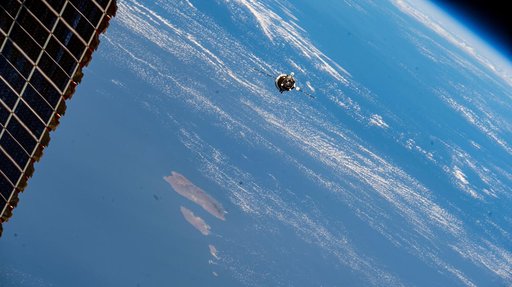 The Progress 90 cargo craft approaches the International Space Station