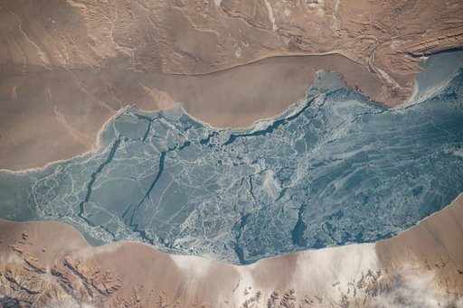 An icy lake in southwestern China's high plateau region