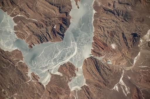 An icy lake in southwestern China's high plateau region