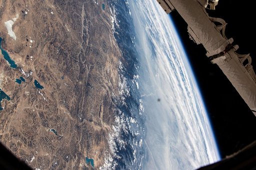 The Himalayas separate China from a cloudy India