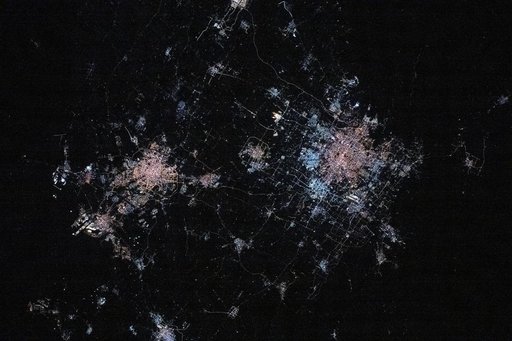 The city lights of Tianjin, Langfang, and Beijing, three cities in China