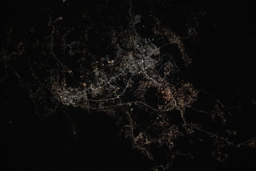 City lights illuminate the cities of Abha, Khamis Mushait, and Ahad Rafidah in Saudi Arabia