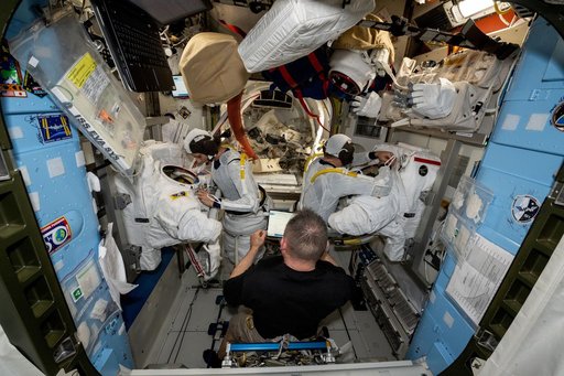 NASA astronauts prepare to evaluate their spacesuits