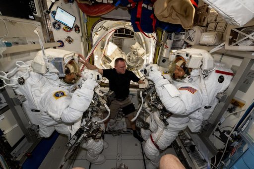 NASA astronauts evaluate their spacesuits
