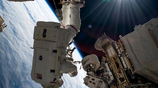 Astronaut Suni Williams attached to the Canadarm2 robotic arm