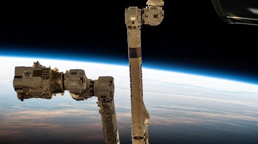 The 57.7-foot-long Canadarm2 robotic arm with its latching end effector