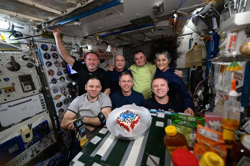 The Expedition 72 crew poses for a portrait inside the Harmony module