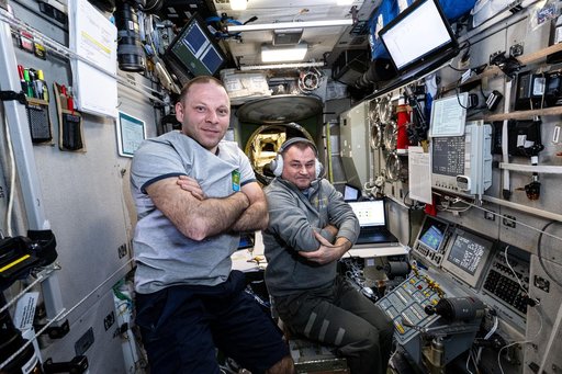 Cosmonauts Ivan Vagner and Alexey Ovchinin inside the Zvezda service module