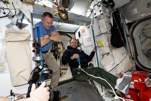 Astronauts Butch Wilmore and Nick Hague relax inside the Harmony module