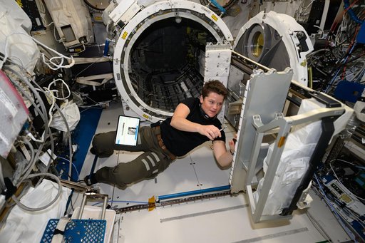 Astronaut Anne McClain  hardware maintenance tasks inside the Kibo laboratory module