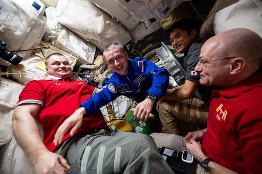 Roscosmos cosmonaut Sergey Ryzhikov enters the International Space Station