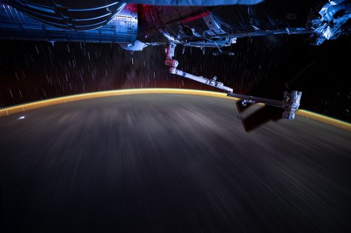 Earth's atmopsheric glow underneath star trails