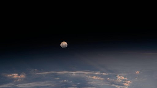 The Moon's light is refracted by the Earth's atmosphere