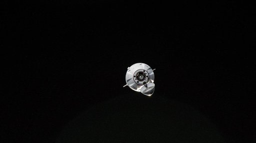 The SpaceX Dragon cargo craft approaches the International Space Station