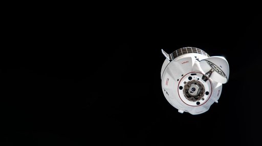 The SpaceX Dragon cargo craft approaches the International Space Station