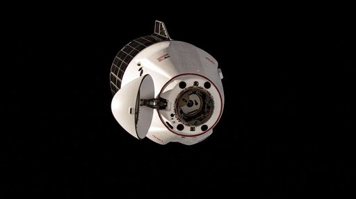 The SpaceX Dragon cargo craft approaches the International Space Station