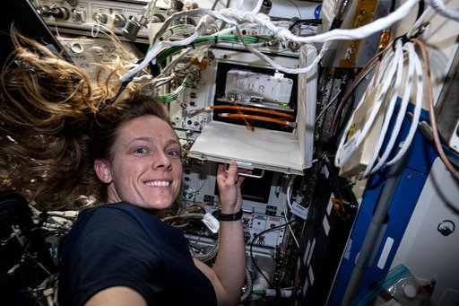 NASA astronaut Nichole Ayers shows off biotechnology research hardware