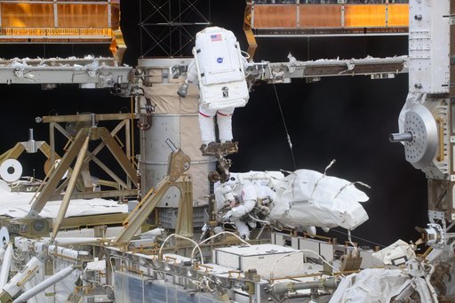 NASA astronauts Anne McClain and Nichole Ayers are pictured during a spacewalk