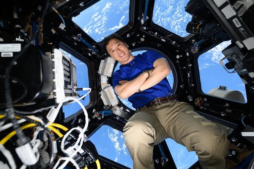 NASA astronaut Jonny Kim poses for a portrait inside the International Space Station's "window to the world"