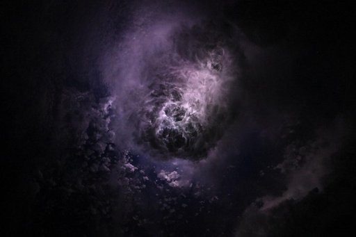 Lightning illuminates the clouds during a storm off the coast of North Carolina