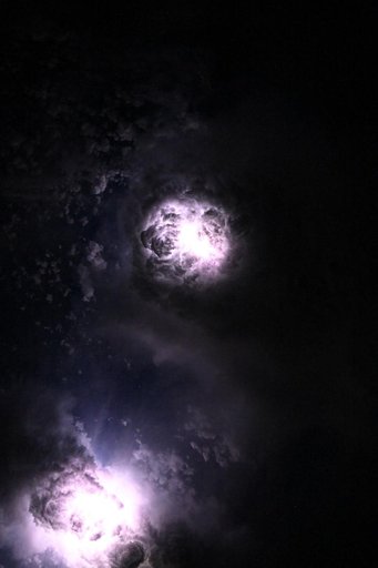 Lightning illuminates the clouds during a storm off the coast of North Carolina