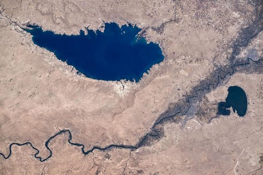 The Euphrates River runs in between Lake Tharthar and Lake Habbaniyah