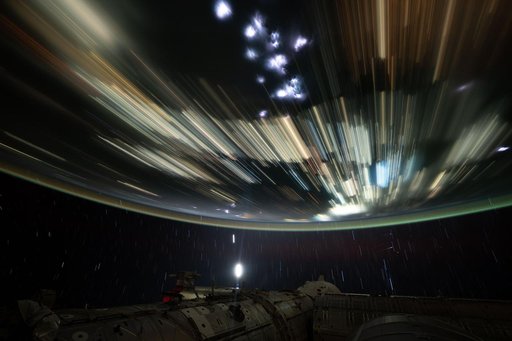 The city lights of Southeast Asia streaking below the International Space Station