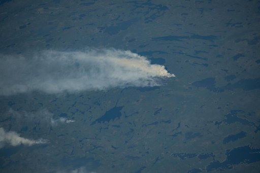 Wildfires burn throughout Canada's central provinces