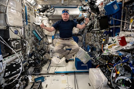NASA astronaut Mike Fincke poses for a portrait inside the Columbus laboratory module