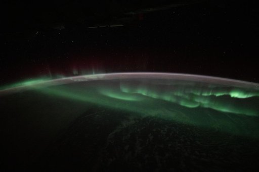 The aurora australis appears above the Indian Ocean southwest of Australia