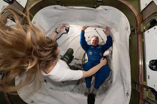 NASA's SpaceX Crew-11 Pilot Mike Fincke is welcomed aboard the station