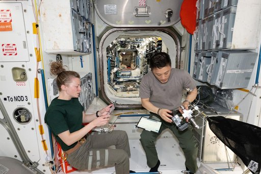 NASA astronauts Jonny Kim and Zena Cardman pose are pictured in the Unity module