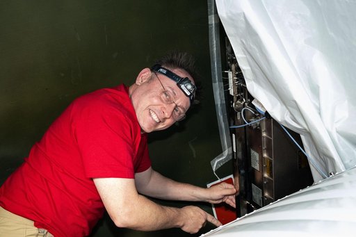 NASA astronaut Mike Fincke pictured during communications maintenance activities